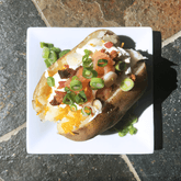 loaded baked potato with toppings