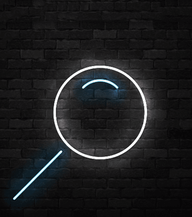neon sign in the shape of a magnifying glass hanging on a brick wall