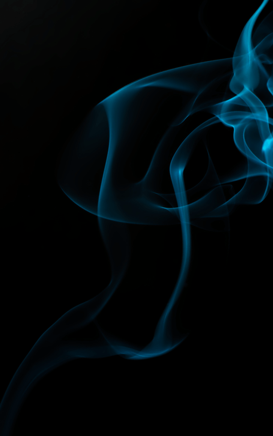 blue smoke against a black background